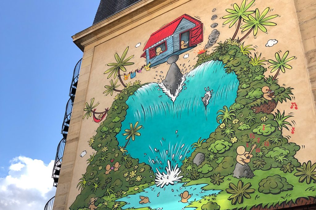 Photographie de la fresque monumentale du street-artiste Jace avec ses personnages les Gouzous